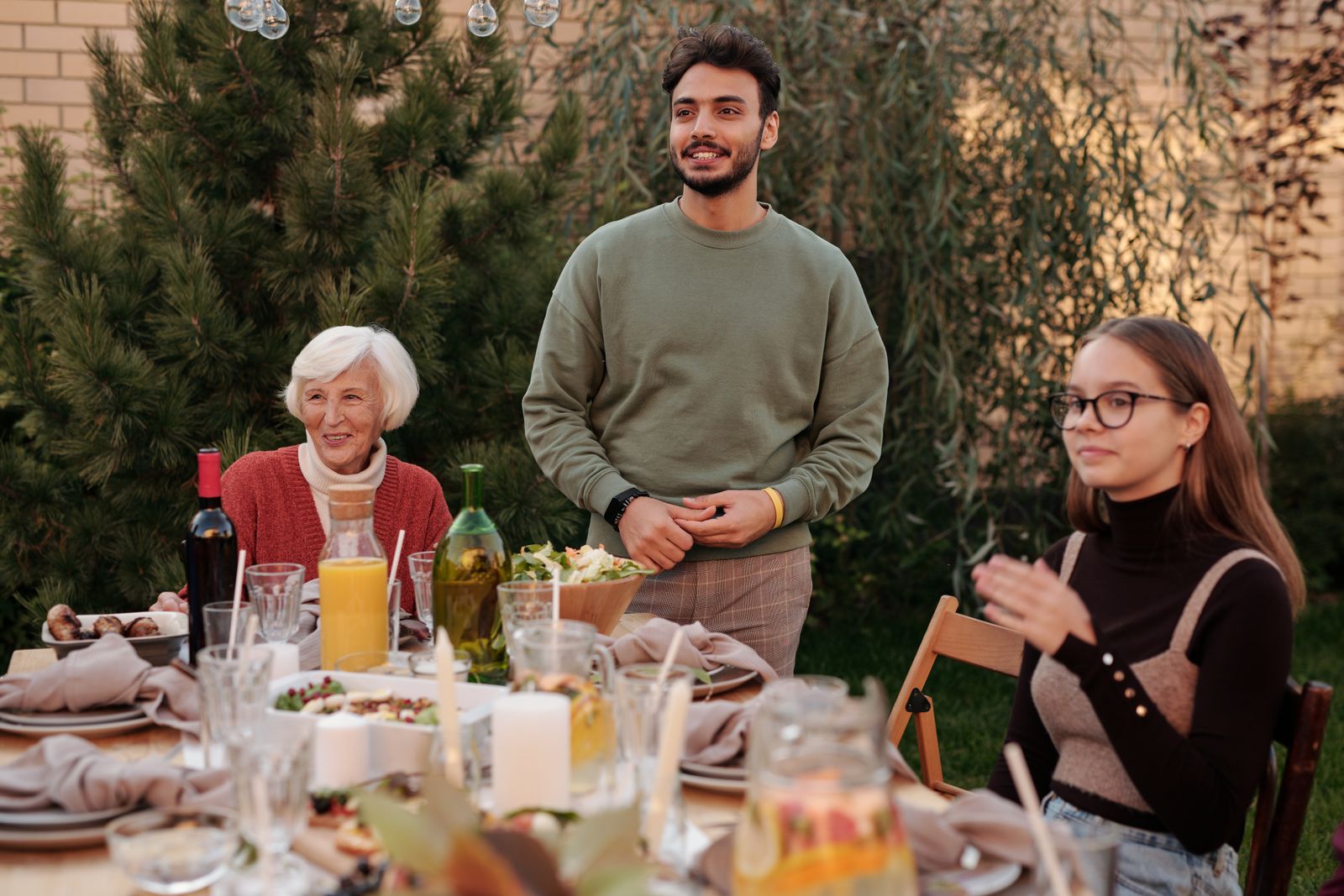 Neighbors sharing a meal in a metro Atlanta backyard